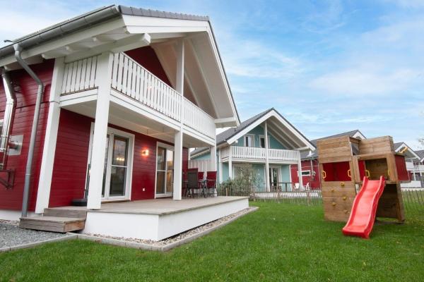 Nella foto è visibile l'oggetto Seepark Süssau Ferienhaus Seeliebe 4 situato nella città di Süssau.