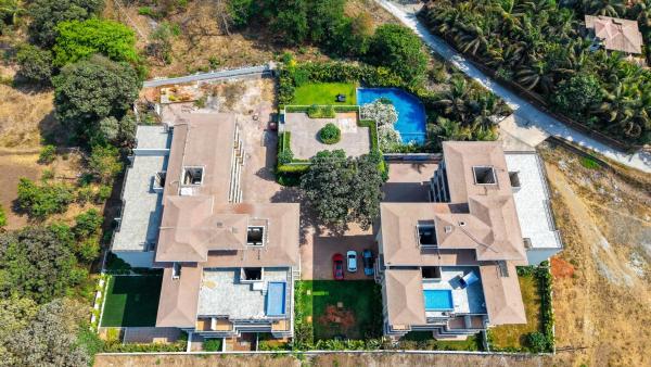 A la foto es mostra l'objecte 4 Bed Private Pool Pent House Villa Alibaug situat a la ciutat de Parhur.