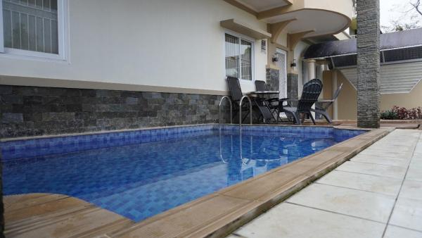 A la foto es mostra l'objecte Diyar Villas Puncak H8/7 situat a la ciutat de Puncak.