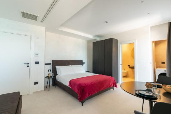 照片显示了位于Trani市的GuestHost - La Rosa dei Venti Apartments物件。
