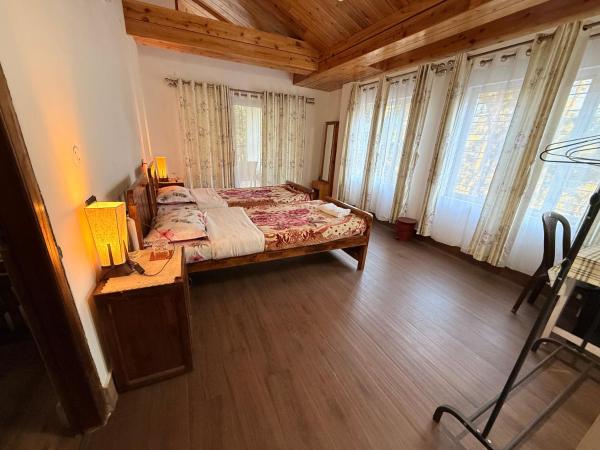 A la foto es mostra l'objecte Cozyo Stays Boutique Home Umiam situat a la ciutat de Borpāni.