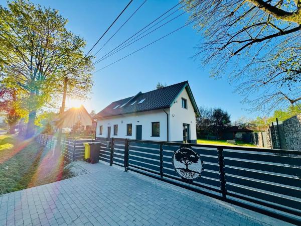 A la foto es mostra l'objecte Agroturystyka Domki za Lipą situat a la ciutat de Okrzeszyn.