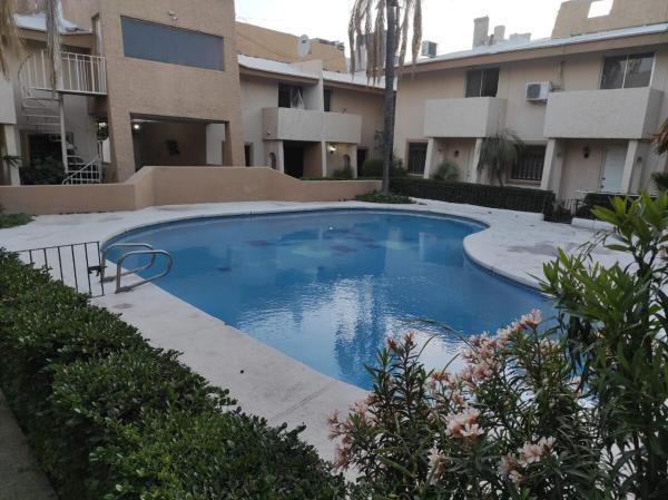 A la foto es mostra l'objecte Quédate con Sandra en Departamento con alberca situat a la ciutat de Hermosillo.
