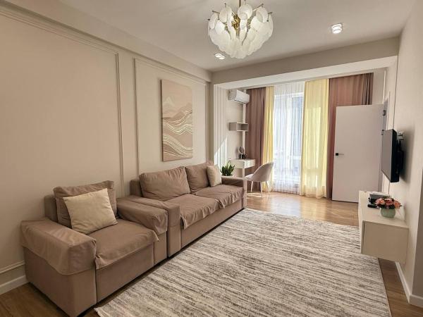 En la foto se muestra el objeto SunHouse apartment ubicado en la ciudad de Tokolʼdosh.