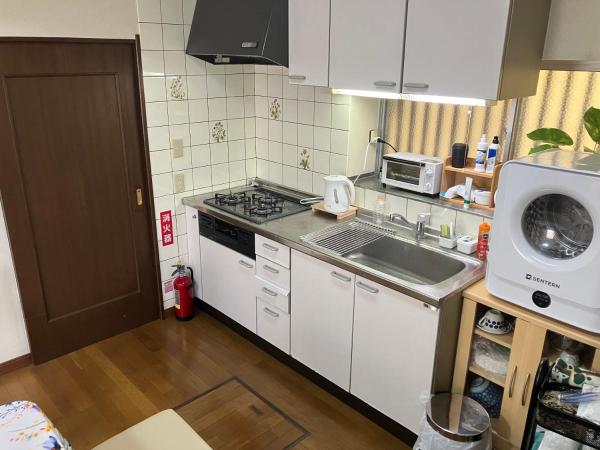 Na zdjęciu widoczny jest obiekt ゆずハウス położony w mieście Chōfu.
