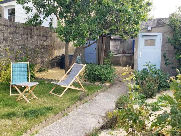 På bildet vises objektet Maison 6-8 personnes, vélos inclus, à 5 min de la gare som ligger i byen Granville.