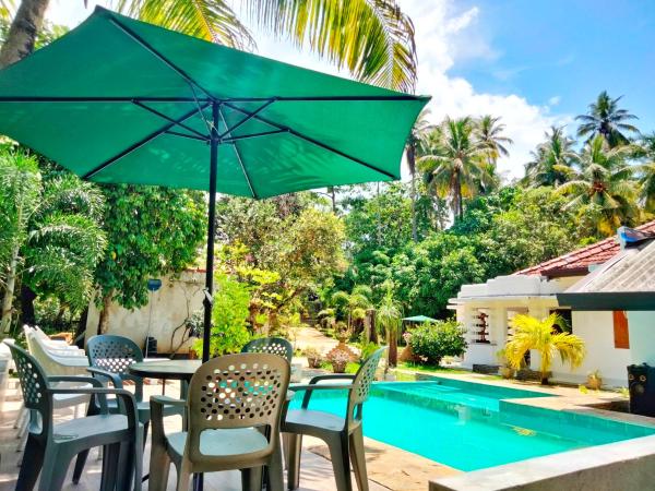 A la foto es mostra l'objecte Cinnamon Estate Villa situat a la ciutat de Matara.