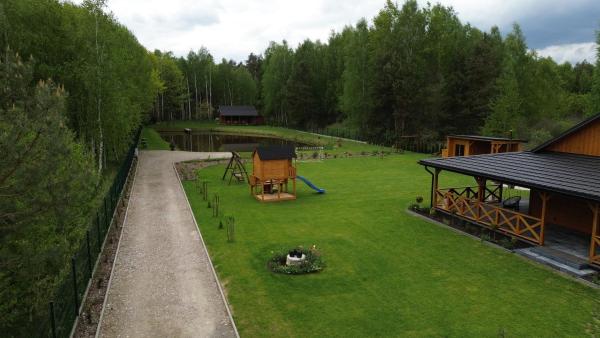 A la foto es mostra l'objecte Dom nad stawem situat a la ciutat de Biłgoraj.