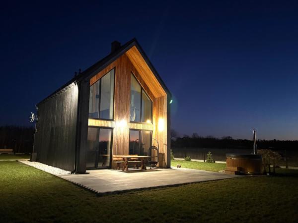 A la foto es mostra l'objecte Dom nad jeziorem sauna balia z jacuzzi situat a la ciutat de Bogaczewo.