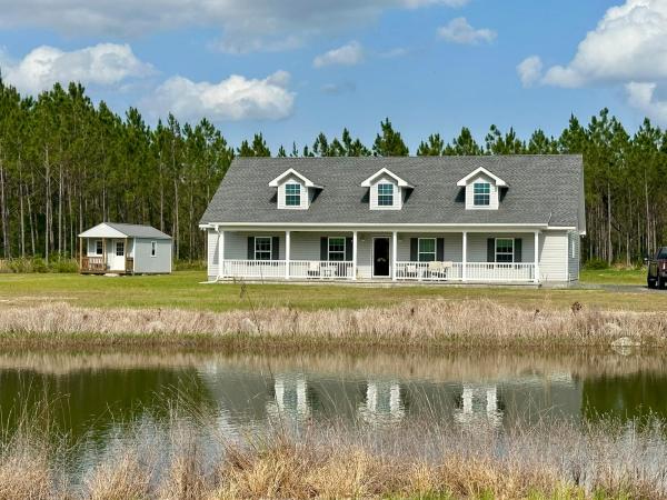 Na fotografii je vidět objekt Modern Farmhouse W Pickleball nacházející se ve městě Millwood.