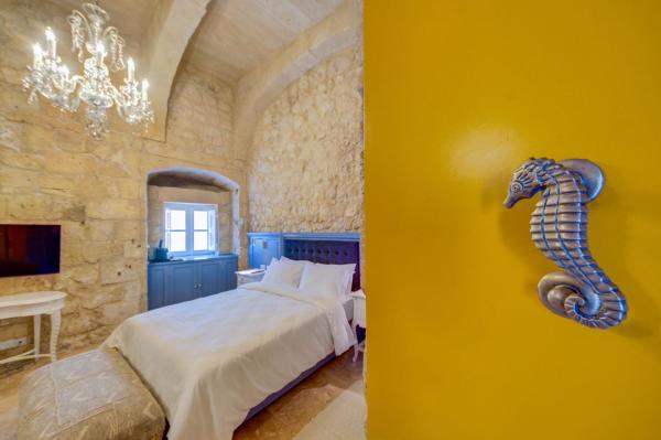 The photo shows the Ta Karmenu - An 800 year old modernized studio, walking distance to Mdina located in the city of Rabat.