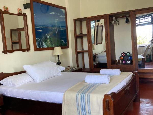 На фото показан объект Woodlands Homestay - Kandy, расположенный в городе Kurukohogama.