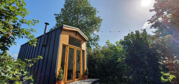 Nella foto è visibile l'oggetto Tiny Haus ca 1 Std von Hamburg entfernt situato nella città di Delve.