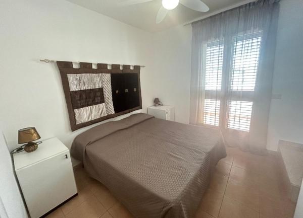 The photo shows the Casa Giritela located in the city of Vieste.