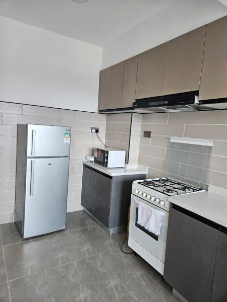 Na zdjęciu widoczny jest obiekt Airport cozy room położony w mieście Gatunga.
