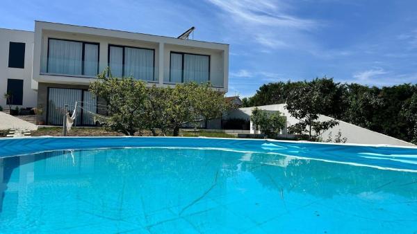 A la foto es mostra l'objecte Magnolienhaus situat a la ciutat de Araújo.