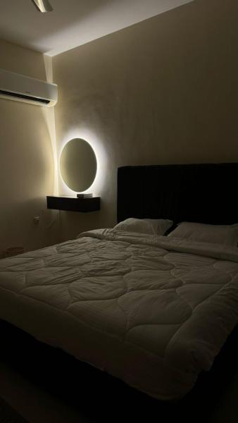 Na foto é possível ver o objeto Hammed Apartment Seeb localizado na cidade de Ḩalbān.