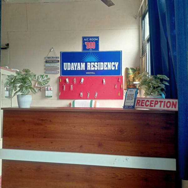 A la foto es mostra l'objecte Udayam Residency situat a la ciutat de Elattūr.