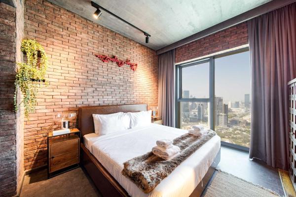 Na zdjęciu widoczny jest obiekt PVH - Edgy and Modern Comfort 1BR Downtown Views 2 położony w mieście Dubaj.