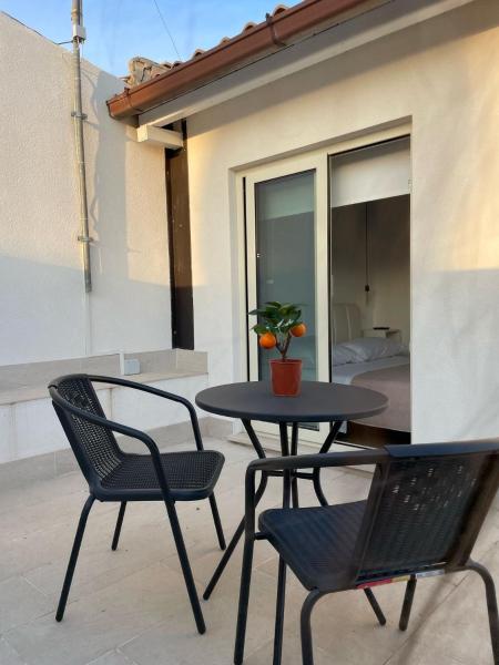 A la foto es mostra l'objecte AZ rooms situat a la ciutat de Noto.