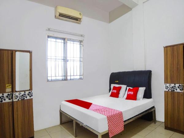 A la foto es mostra l'objecte OYO 92403 Gatsu Homestay situat a la ciutat de Medan.