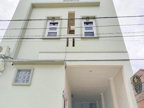 写真にはRawabagol市にあるU Eleven Syariah Homestayが写っています。