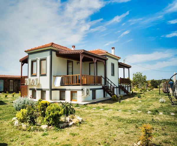 A la foto es mostra l'objecte Tinos Otel & Bağ Evi 12 Yaş Üstü situat a la ciutat de Bozcaada.