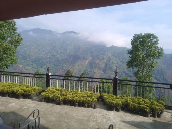 Na fotografii je vidět objekt Teesta valley homestay garden view nacházející se ve městě Jāmb.
