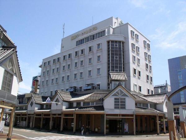 The photo shows the Takada Terminal Hotel located in the city of Joetsu.