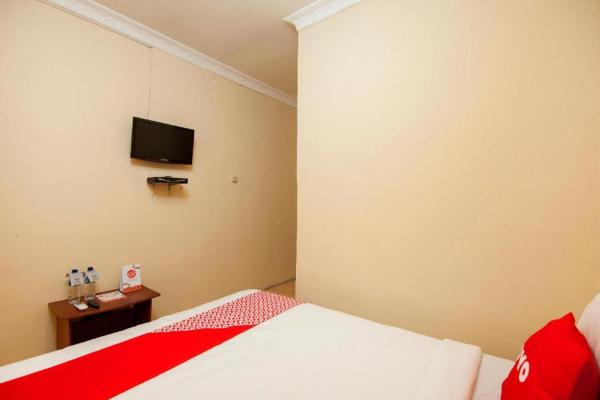 Na fotografii je vidět objekt Hotel O 211 nacházející se ve městě Parapat.