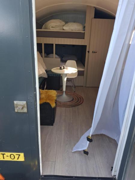 Auf dem Foto ist das Objekt De Zonnewagen in der Stadt Westhoek zu sehen.