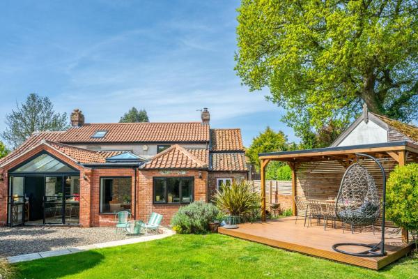 A la foto es mostra l'objecte Holly Cottage Edgefield situat a la ciutat de Hempstead.