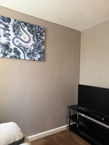 A la foto es mostra l'objecte Cozy Chamber and hall situat a la ciutat de Durrington.