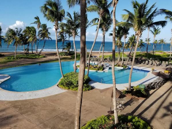 На фото показан объект Beachfront Luxury 2BR Villa-Villa Celeste Rio Mar, расположенный в городе Carmelita.
