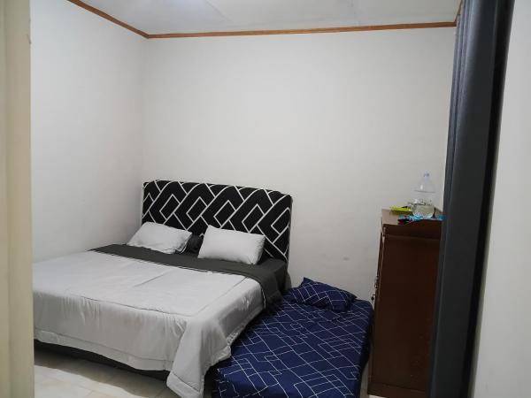 A la foto es mostra l'objecte MENPoRKOsT DaN FaMILY Homestay situat a la ciutat de Bukittinggi.
