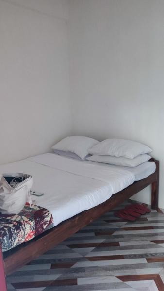 The photo shows the Lawrence Apartment located in the city of Bukal.