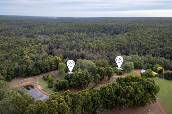 The photo shows the River Bend Retreat I Private Properties located in the city of Nannup Mill.