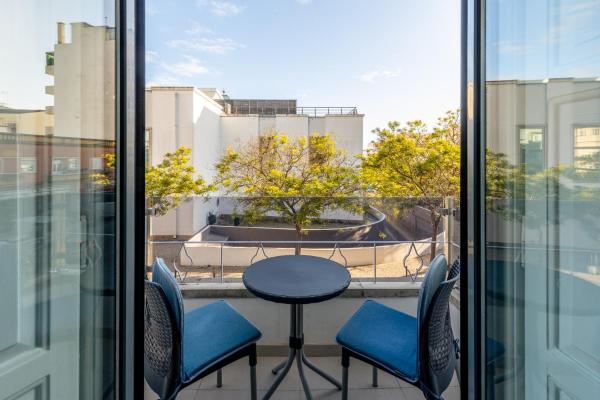 A la foto es mostra l'objecte Mercado Apartments situat a la ciutat de Faro.
