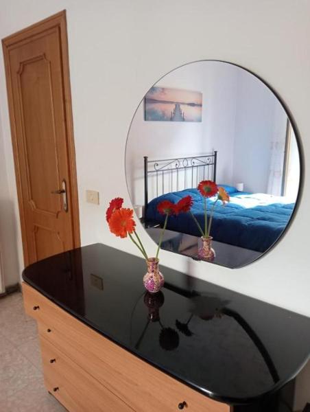 Nella foto è visibile l'oggetto SUN & MOON Apartment situato nella città di Labaro.