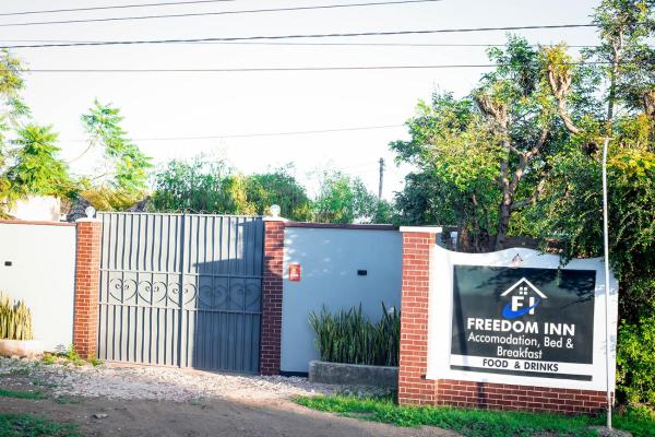 The photo shows the freedom inn located in the city of Mkulat.
