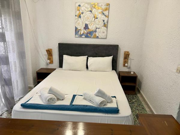 写真にはペフコホリ市にあるPELEKAN rooms and apartments ΑΤΗΙΝΑ 21が写っています。