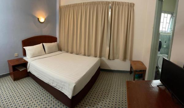 Na fotografii je vidět objekt New Caspian Hotel nacházející se ve městě Ipoh.