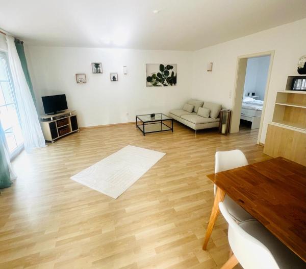 A la foto es mostra l'objecte Moderne & gemütliche Ferienwohnung mit Terasse in Nieder-Olm situat a la ciutat de Harxheim.