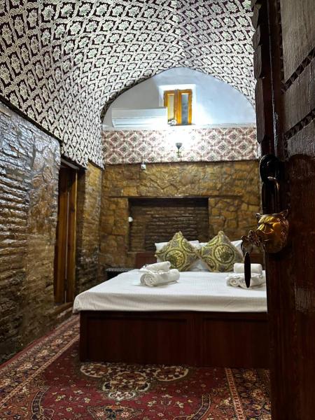 The photo shows the Historical Caravan Sarai XIX Century Mekhtar Anbar located in the city of Bukhara.