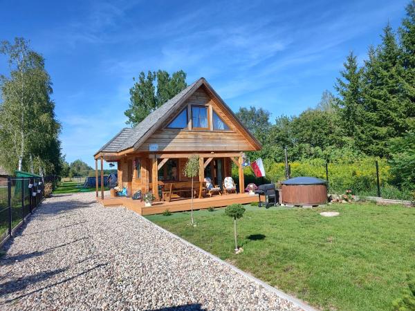 Nella foto è visibile l'oggetto Pokój w domku z bala w Suszczy situato nella città di Słobódka.