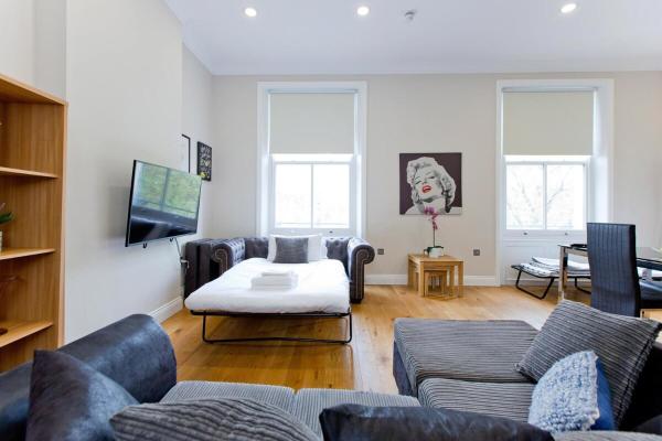 Фотография 5: Chic & Trendy 1BR Flat in Prime Location