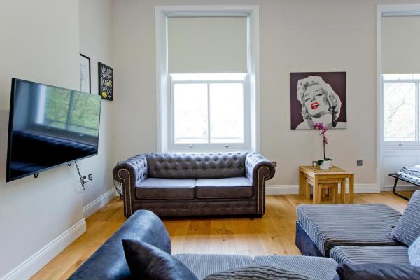 Фотография 9: Chic & Trendy 1BR Flat in Prime Location
