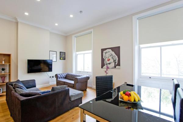 Фотография 6: Chic & Trendy 1BR Flat in Prime Location