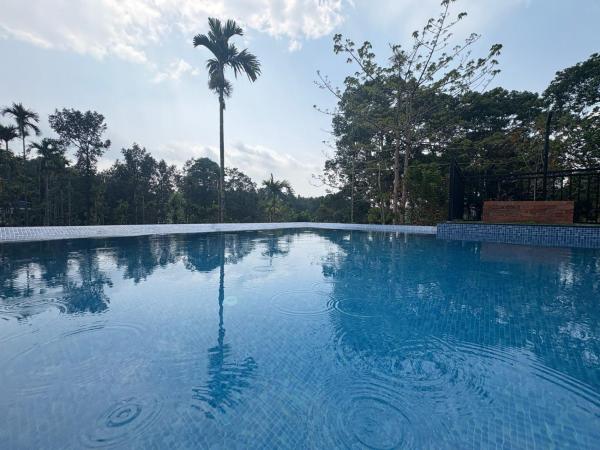 A la foto es mostra l'objecte The Golden Oak A Classic Villas situat a la ciutat de Vythiri.