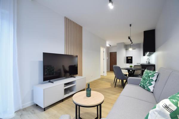Na zdjęciu widoczny jest obiekt Apartament Szmaragd&Perła by LookAp - parking gratis! położony w mieście Suchy Las.